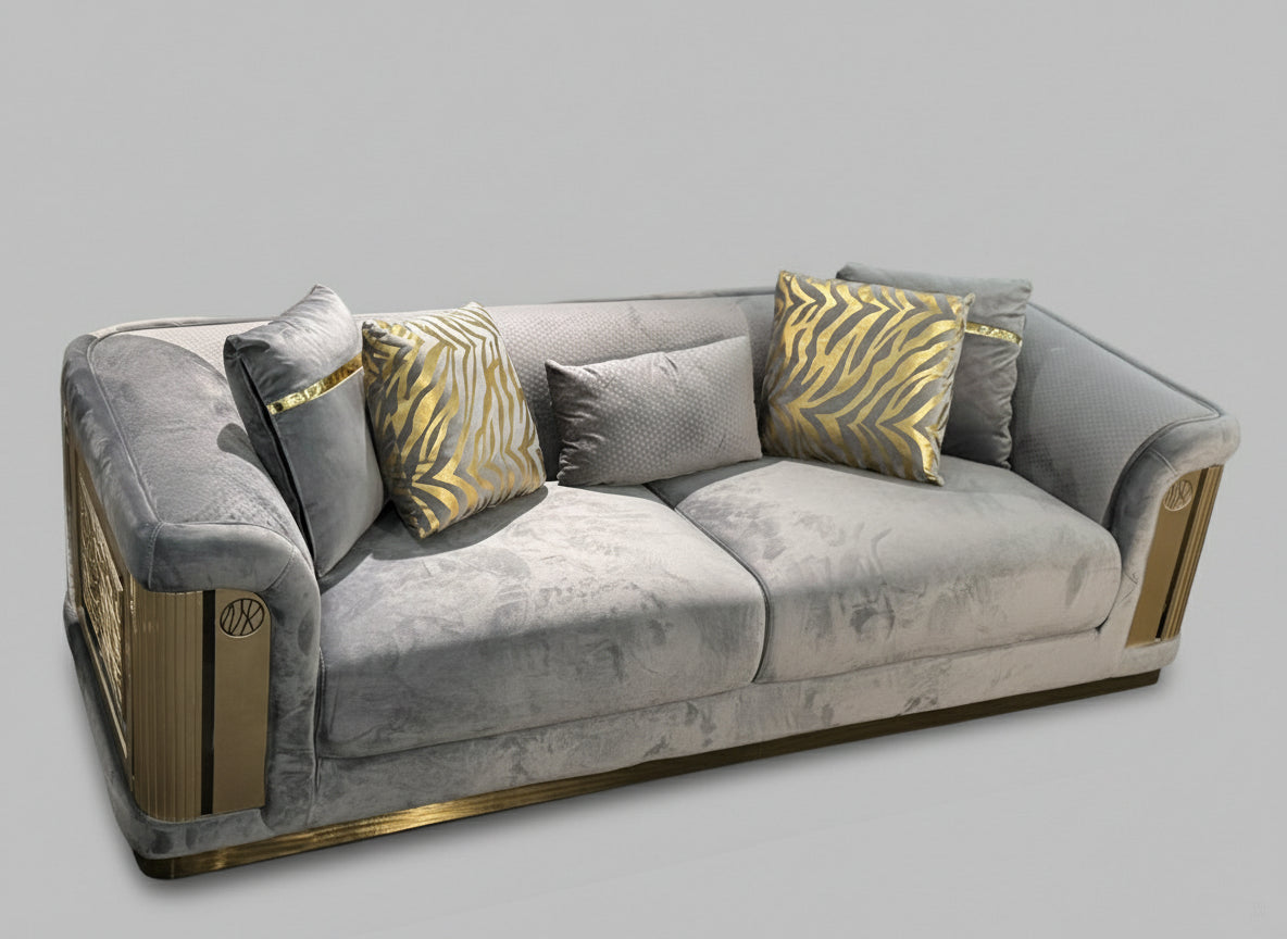 Gray sofa with decorative pillows on a light gray background